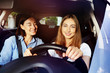 © Sergey Novikov - Happy adult daughter driving her mother in car