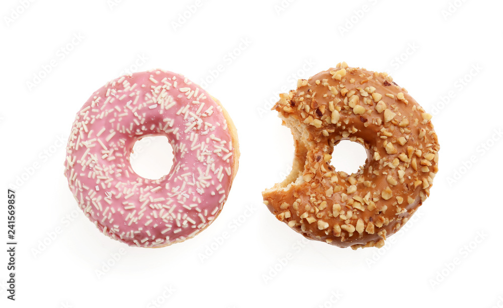 Sweet tasty donuts on white background
