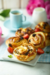 Wall Mural - Sweet rolled buns with custard and raisins