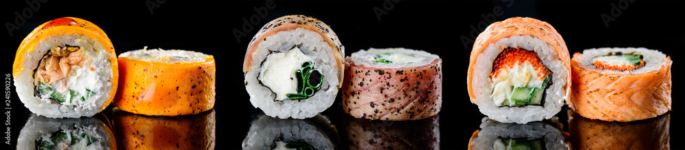 baked hot sushi rolls on a dark background. Hot fried Sushi Roll Sushi menu - obrazy, fototapety, plakaty 