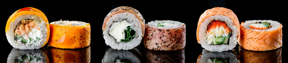 Canvas Print - baked hot sushi rolls on a dark background. Hot fried Sushi Roll Sushi menu