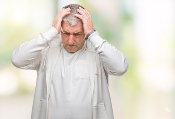 Sticker - Handsome senior man wearing sport clothes over isolated background suffering from headache desperate and stressed because pain and migraine. Hands on head.