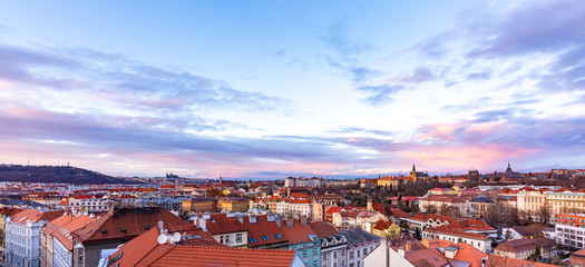 Wall Mural - Prague panorama from Vysehrad castle. Cityscape during the sunset, magical and beautiful colors. Colorful clouds above the czech capital city