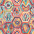 Seamless pattern in patchwork style. Ethnic and tribal motifs. Handwork. Vector illusion