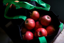 Close Up Of Fresh Ripe Apples In Bag