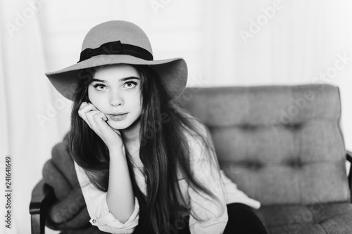 Fotografie, Obraz Close up portrait of young cheerful positive emotional casual girl in fashionable hat