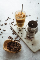 Vietnamese coffee on concrete background.