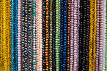 Hanged beads necklaces at a store.