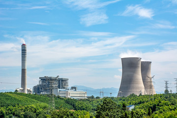 Chimneys and cooling towers of coal-fired power plants