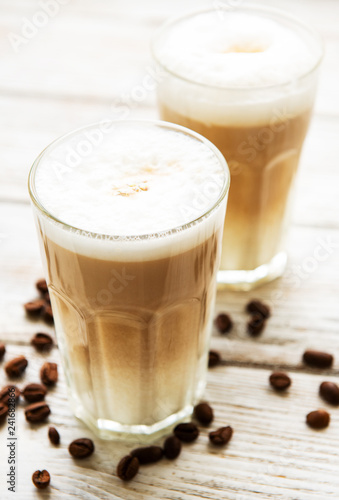 Fotografie, Obraz Two glasses of latte coffee and coffee beans