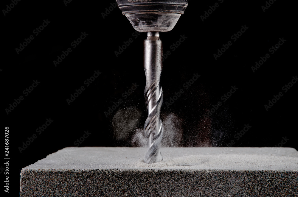 Closeup view of concrete drill bit - obrazy, fototapety, plakaty 
