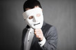 © Daniel - man hand mask