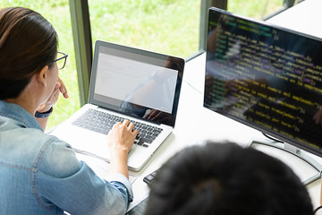 Wall Mural - programmer working in a software development and coding technologies. website design.technology conc