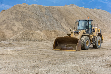 Wall Mural - Excavator in a sand quarry