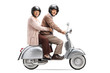 © Ljupco Smokovski - Senior couple with helmets riding on a vintage scooter