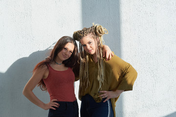 portrait of two girls hugging. friendship concept. smiling teenagers