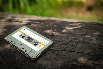 Wall Mural - Vintage compact cassette on table background, Close up set of old audio tapes, Retro