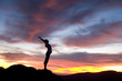 © Tandem Stock - Young woman doing yoga in Yosemite National Park, CA.