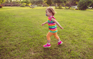 Sticker - little girl spending time at backyard