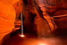 A Shaft Of Light Illuminates Upper Antelope Canyon, AZ.