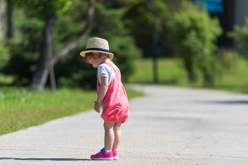 Sticker - little girl runing in the summer Park