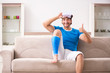 © Elnur - Leg injured young man on the sofa