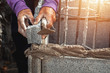 worker installing bricks in construction site