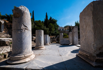 Detail of ruined columns at the Agora, Athens, Greece in summer