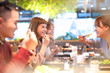 © Tom Wang - young friends  eating hot pot in the restaurant