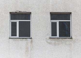 Two windows on the wall in the house as a background