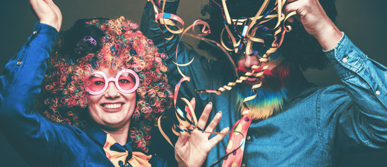 Wall Mural - Portrait of party Men and woman in wig and glasses Carneval 