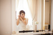 © LT - bride in front of mirror