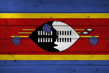 Wall Mural - Flag of Swaziland on wooden background, surface. Wooden wall, planks. National flag