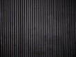 Black wood plank wall texture background. Vertical wooden. Loft style 