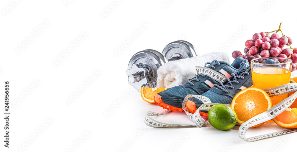 Sport shoes dumbbells fresh fruit measure tape and multivitamin juice isolated on white background. Healthy sport and diet concept. - obrazy, fototapety, plakaty 