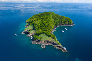 Wall Mural - SCUBA diving boats around a remote, beautiful tropical island (Ko Bon)