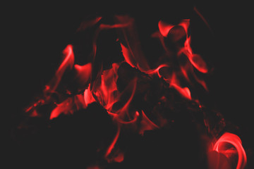 Campfire bright heat flame background. Bonfire bright red flame. Strong fire close up. Holiday cosy chimney fireplace.