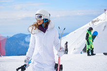 Woman Skier Close Up Portrait Wearing White Healmet With Mask In Snow Winter Mountain