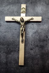 Wall Mural - cross on wooden background