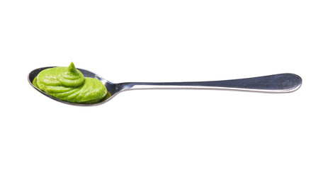 Wasabi sauce in small metal spoon  isolated on white background,t