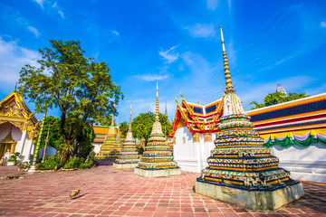 Pagoda buddha temple at Wat pho one of attraction sightseeing in morning with blue sky cloud