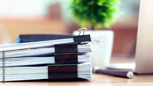 Cuadros en Lienzo Stack of documents placed on a business desk in a business office