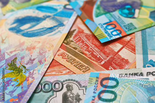 Fotografie, Obraz Heap of mixed paper notes of the Russian ruble of different issues and face value
