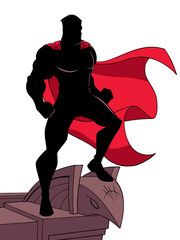 Poster - Silhouette of a superhero watching over the city from the roof of a tall building. The hero and the building are isolated on white background which can be used as copy space.