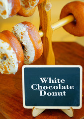 Wall Mural - Fresh white chocolate donuts