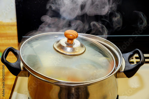 Fotografie, Obraz Close up boiling pork and chicken soup or boiled water in hot in pot boiling foo