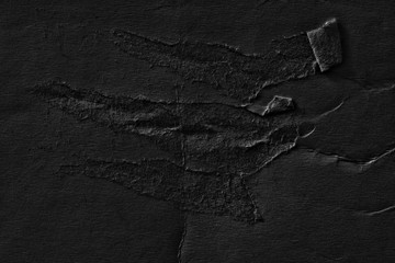 Dark black grey paper background creased crumpled surface old torn ripped posters grunge textures placard backdrop empty space for text