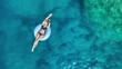 © biletskiyevgeniy.com - Aerial view at the girl on sea. Turquoise water from air as a background from air. Natural seascape at the summer time. Seascape from drone