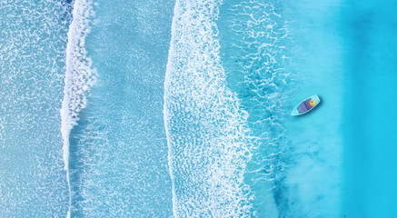 Wall Mural - beach and waves from top view. turquoise water background from top view. summer seascape from air. t