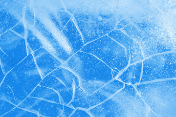 Wall Mural - abstract ice background. blue background with cracks on the ice surface